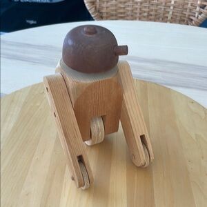 Handmade wooden robot toy.
